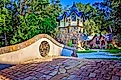  A footbridge leads to Mosher Castle in Fairhope, Alabama. Editorial credit: Carmen K. Sisson / Shutterstock.com.