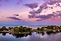 Aerial panorama of the Cedar Point peninsula at dusk, in Sandusky, Ohio, on Lake Erie.