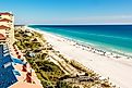 Miramar Beach stretch in Destin, Florida, with emerald green Gulf waters.