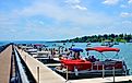 Crowds and boats along the Skaneateles lakefront on a sunny summer day in New York. Editorial credit: PQK / Shutterstock.com