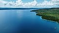 The blue fresh waters of Lake Tanganyika in Zambia, Africa. An inland sea and longest lake in the world