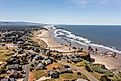 Aerial View of homes on the bluff in Bandon, Oregon, during a beautiful summer day.