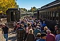 People preparing to board the historic train in Essex, Connecticut. Image credit Bob Pool via Shutterstock