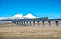 Trains on the Qinghai-Tibet Railway run on the Kunlun Mountains and the Gobi Desert in the Hoh Xil uninhabited area.