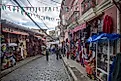 People walk on the streets of La Paz, Bolivia. Bolivia reports the lowest incomes out of any South American country. Editorial credit: Goran Bogicevic / Shutterstock.com.