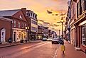 Annapolis, Maryland, USA downtown cityscape on Main Street at dawn.