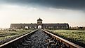 Railroad Track and the Gate of Death - Entrance of Auschwitz. Image used under license from Shutterstock.com.