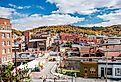 Cumberland, Maryland city-view with fall foliage in the background. Editorial credit: Kosoff / Shutterstock.com
