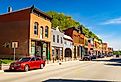 Main Street in McGregor Iowa featuring local shops and businesses in the historic downtown district. Editorial credit: Photo Spirit / Shutterstock.com