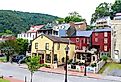 Downtown residential and commercial buildings during the day in Harpers Ferry, West Virginia. Image credit Khairil Azhar Junos via Shutterstock
