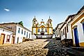 Colorful colonial houses and church in the city of Tiradentes in Brazil.