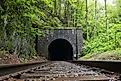 East Portal of the historic Hoosac Tunnel near North Adams, MA—an iconic 19th-century railroad tunnel framed by rugged stone and forested Berkshire scenery.