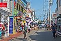Commercial Street in Provincetown, Massachusetts, USA, known for its eclectic range of stores, cafes, and restaurants. Editorial credit: Mystic Stock Photography / Shutterstock.com
