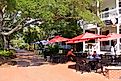 People dining outside a restaurant in Henry C. Chambers Waterfront Park in Beaufort, SC