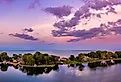 Aerial panorama of the Cedar Point peninsula at dusk, in Sandusky, Ohio, on Erie Lake.