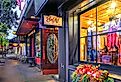 Sidewalk view of Main Street with quaint upscale shops in the historic village of Chagrin Falls, Ohio. Image credit Lynne Neuman via Shutterstock.