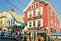  Traditional shops on Wharf Street in Boothbay Harbor. Image credit Conny Pokorny via Shutterstock.
