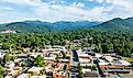 Aerial view of Black Mountain, NC, showcasing a charming town surrounded by lush green forests and mountainous landscape. Editorial credit: Red Lemon / Shutterstock.com