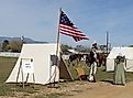 A historical reenactment at Fort Verde State Historic Park in Arizona. By Joyce Cory, CC BY 2.0, Wikimedia Commons.
