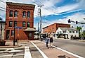 The historic brick buildings downtown Saco, Maine. Image credit Enrico Della Pietra via Shutterstock
