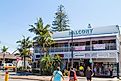 Byron Bay, New South Wales: Tourists enjoying a sunny beach day shopping in the town, via ampueroleonard / iStock.com