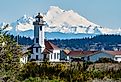 Mount Baker and lighthouse in Port Townsend, Washington.