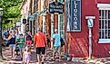 Boutique-lined street in Nantucket. Image credit Mystic Stock Photography via Shutterstock.