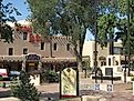 Taos Plaza and the Hotel La Fonda via Wikicommons