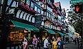 Shoppers and pedestrians near Tudor style building on Witherspoon Street in Princeton, New Jersey. Editorial credit: Benjamin Clapp / Shutterstock.com