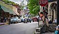 A man playing a guitar in the downtown area of Eureaka Springs, Arkansas. Editorial credit: shuttersv / Shutterstock.com