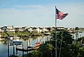 Luxury waterfront vacation homes on the back bay in Avalon, New Jersey. Editorial credit: ThreeRivers11 / Shutterstock.com