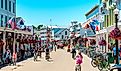 A busy day in downtown Mackinac Island, Michigan. Image credit: Michael Deemer via Shutterstock.com.