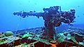 Machine gun on ship sunk during Operation Hailstone in Chuuk Lagoon, Micronesia (Credit: SylvainPH / Shutterstock)