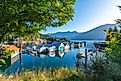 Early morning sunlight on the shipyard, marina and dock on Kootenay Lake in Kaslo Bay, in Kaslo, British Columbia.
