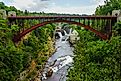 Bridge and Rainbow Falls at Ausable Chasm in Upstate New York. The gorge is about two miles 3.2 km long and is a tourist attraction in the Adirondacks region of Upstate New York.