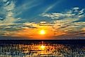 Sunset over the waters of Lake Okeechobee in Florida.
