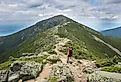 Young teenage girl walking on the Franconia Ridge Trail in New Hampshire’s White Mountains.