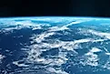 Amazing blue planet Earth with ocean and clouds in outer space on a starry sky. Elements of this image furnished by NASA. 