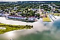 Chincoteague Island, marinas, houses and motels with parking lots.