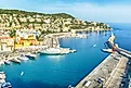 Aerial view of harbor of Nice and Mediterranean Port Lympia with yachts under blue sky, Cote d'Azur, French Riviera, France. Editorial credit: laraslk / Shutterstock.com