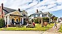  Bakery and Cafe in downtown fort mill south carolina, with multiple people eating outside on picnic tables.