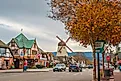 A Danish windmill and buildings along Main Street in Solvang, California. Editorial credit: HannaTor / Shutterstock.com