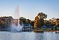 Fountain and gazebo in late afternoon at Oxford Lake Park in Oxford, Alabama. Image credit: JNix / Shutterstock.com.