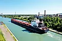 An aerial view of a Lake Freighter leaving a lock in the Welland Canal, Canada