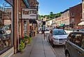 Quaint shops and historic brick buildings line the Main Street of Galena, Illinois. Image credit Wirestock Creators via Shutterstock