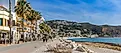 Panorama of the seaside boulevard with bars and restaurants in Javea, Spain. Image Credit: Marc Venema via Shutterstock.com