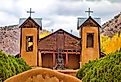 The famous historic Sanctuary of Chimayo with a garden in New Mexico, US.