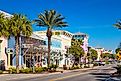 Photo of a street with colorful storefronts in downtown Panama City Beach, Florida