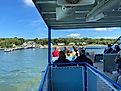 Passengers aboard the Miller Ferry watch as it approaches the docks at South Bass Island, aka “Put-In-Bay”.  Photo credit: Andrew Douglas