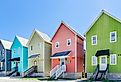 Colorful beach houses along the coast in Dauphin Island, Alabama. Image credit Carmen K. Sisson via Shutterstock